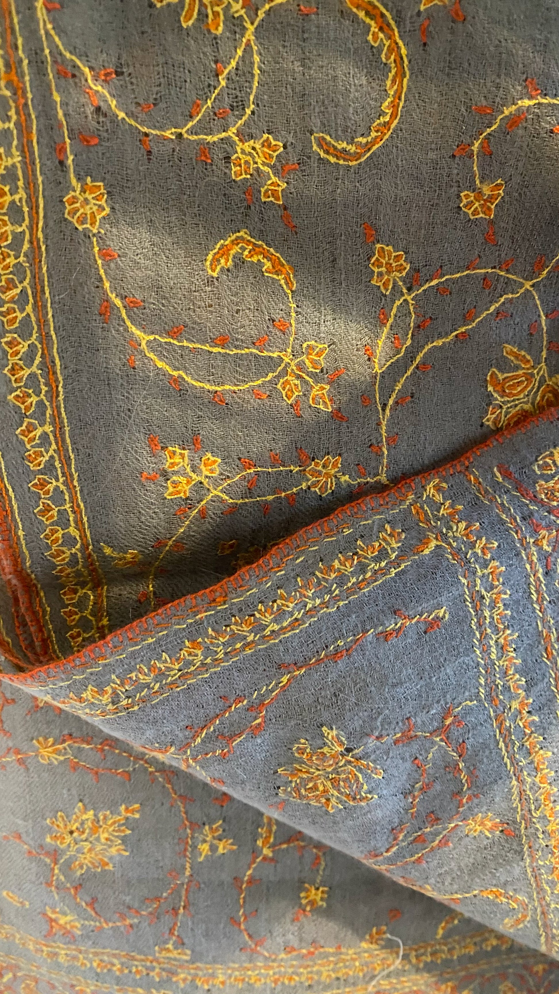 Laal's Pashmina Jaalidar Stole with Embroidery. At 70x200 cm and a mere 120 grams, it epitomizes luxury in every fiber. The stole, woven from the rare Yangir wool of the Himalayan Ibex, promises unparalleled softness.