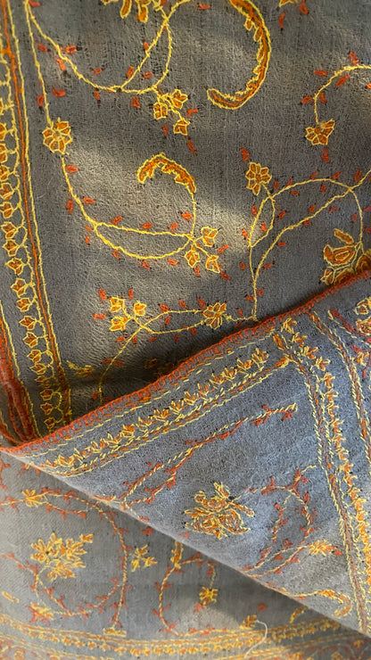 Laal's Pashmina Jaalidar Stole with Embroidery. At 70x200 cm and a mere 120 grams, it epitomizes luxury in every fiber. The stole, woven from the rare Yangir wool of the Himalayan Ibex, promises unparalleled softness.