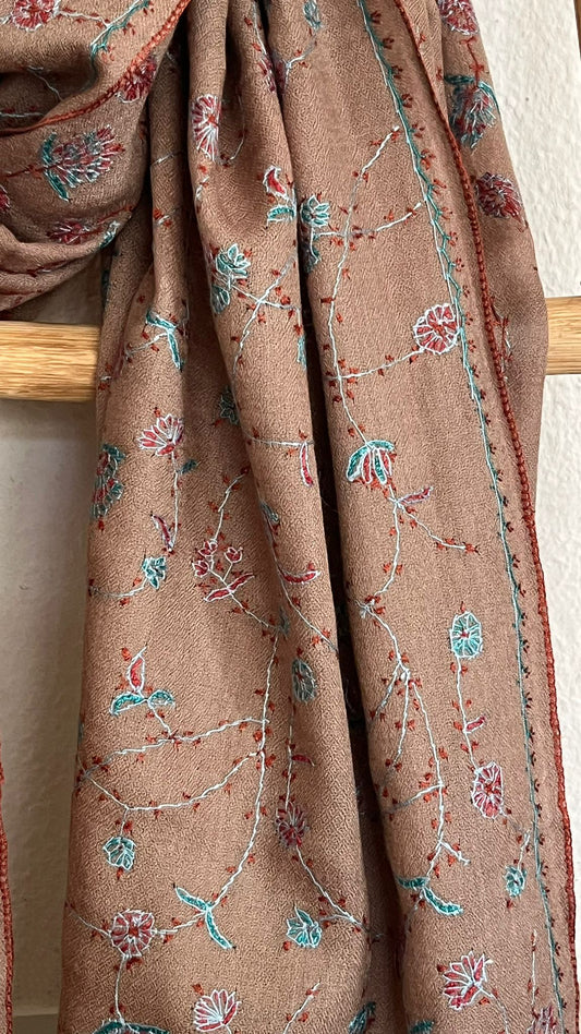 Laal's Pashmina Jaalidar Shawl with Embroidery. Handwoven and hand-embroidered in Kashmir, this Pashmina shawl merges artisanal skill with luxurious material. Weighing 120 grams and sized at 101x203 cm, it's crafted from soft Cashmere wool.